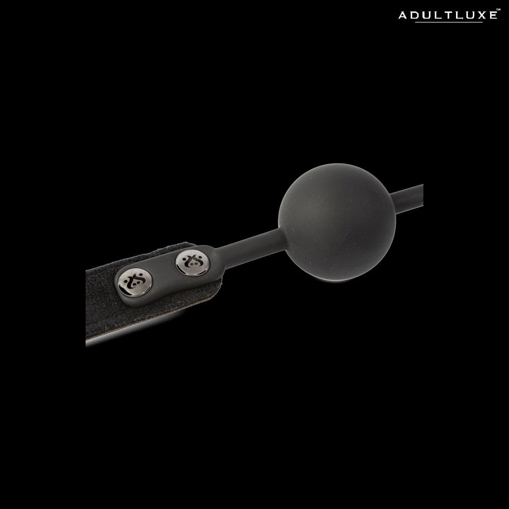SEI MIO Strictly Come Quietly ball gag - close-up of matte silicone ball and branded metal snap fasteners